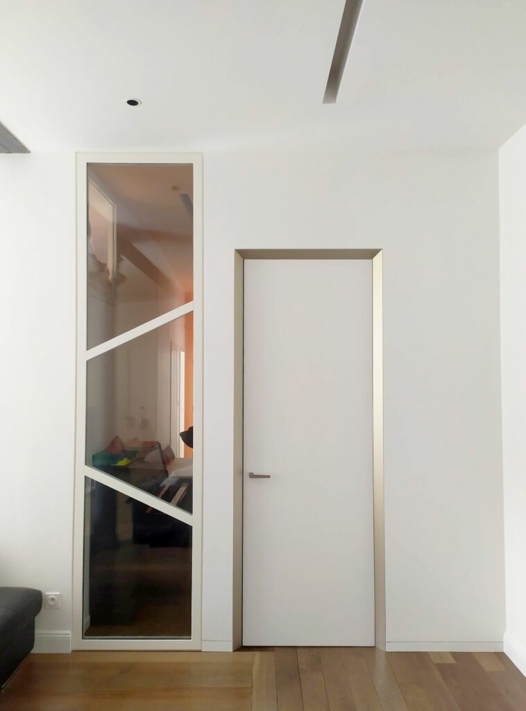 Architecture d'intérieur et mobilier dans un appartement confié à l'agence ARCHIMEL, à Metz. Photographié en juin 2023. ECLISSE 40