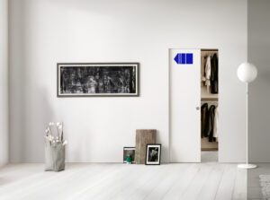 Portes coulissantes invisibles avec accessoire BIAS pour un amortissement de la porte à son ouverture.