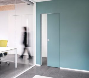 Portes coulissantes invisibles Syntesis Line ambiance bureaux.